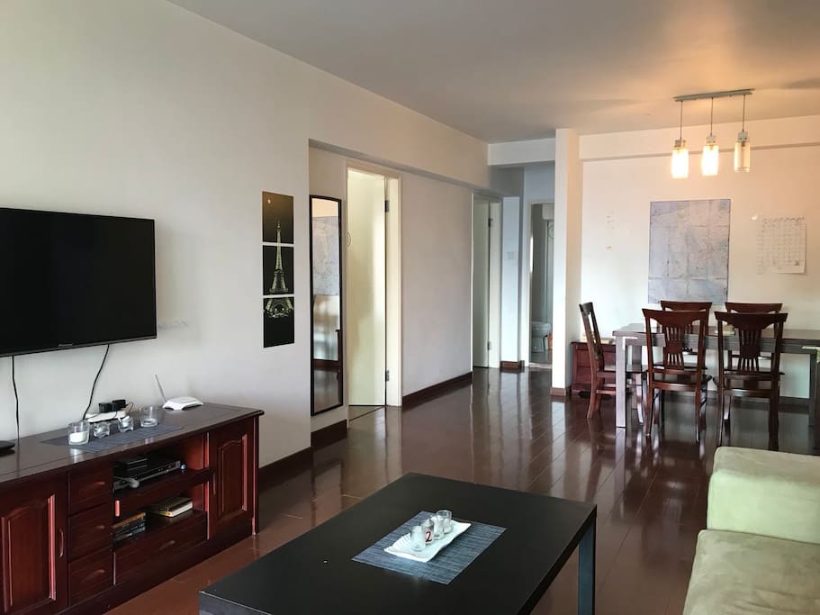 Spacious shared living room with LED TV with numerous movies and TV series