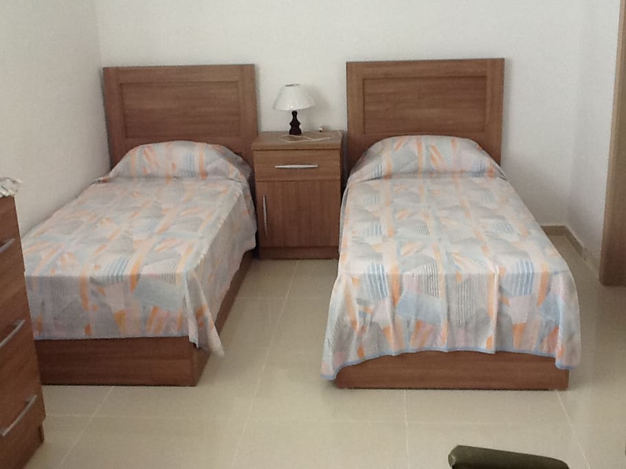 Large bedroom suite with three single beds. All brand new.