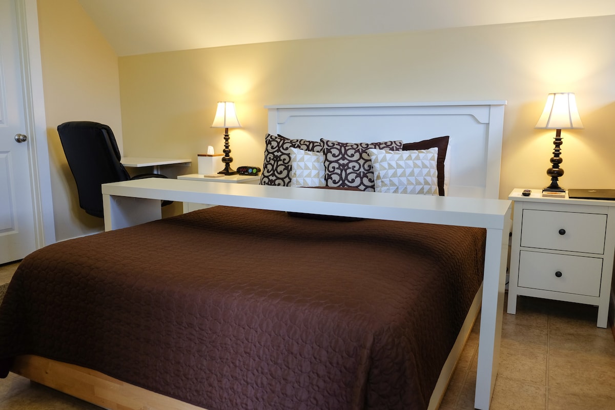 Comfy Queen Bed with Overbed Table