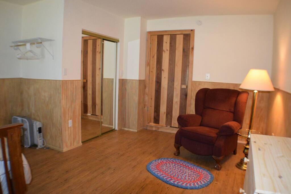 Master bedroom with recliner.
