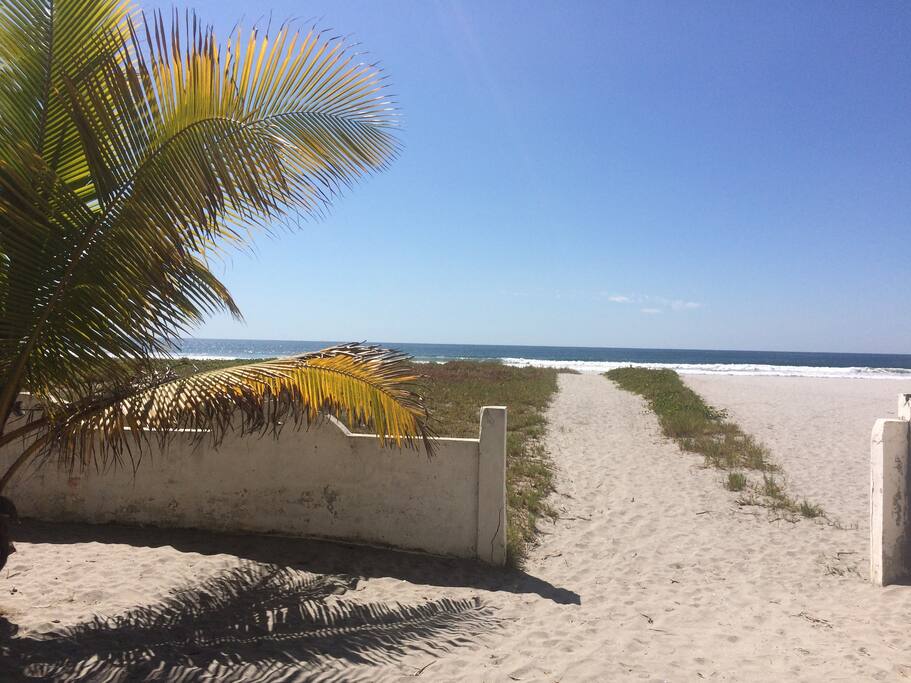 This is the pathway to heaven, directly from Bella Ciao, your bungalow, to the sand dune and the waves.