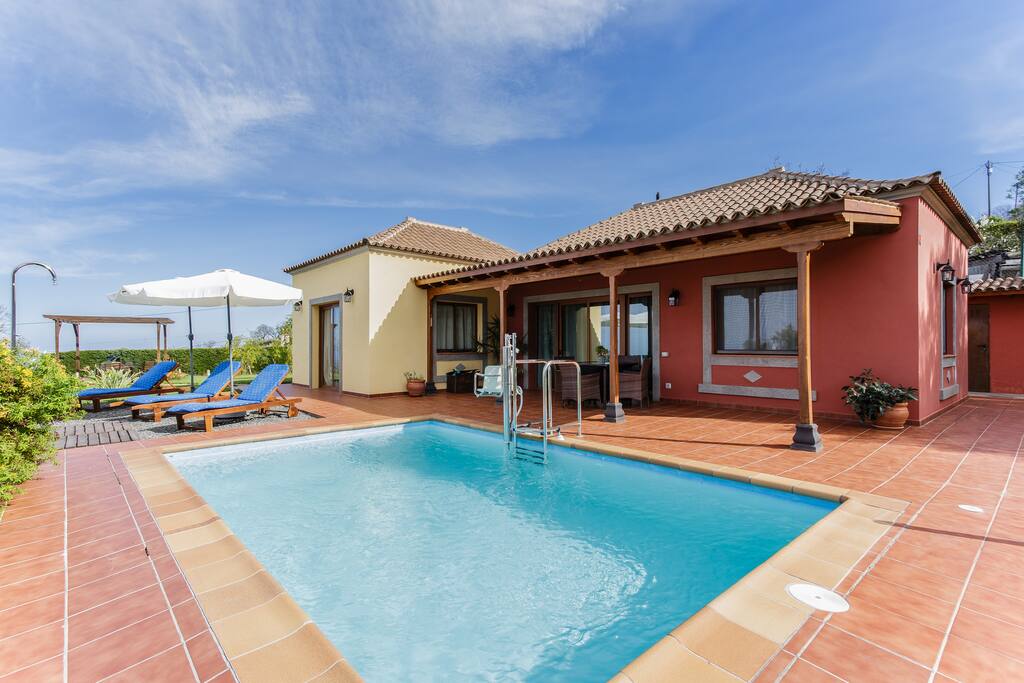 Heated swimming pool with disabled access, pool toys, games, garden.