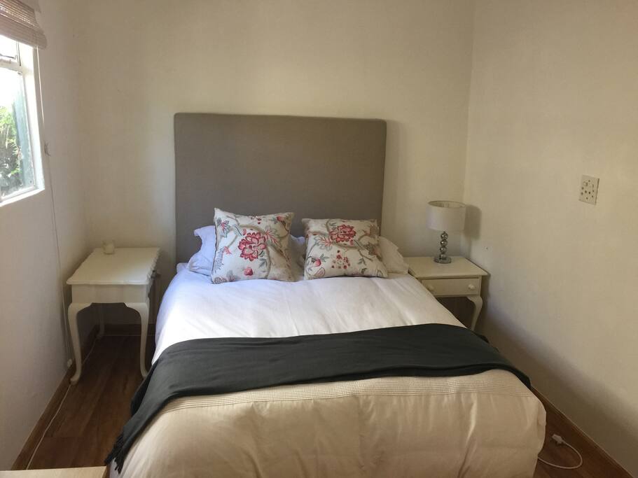 Sunny bedroom with double bed