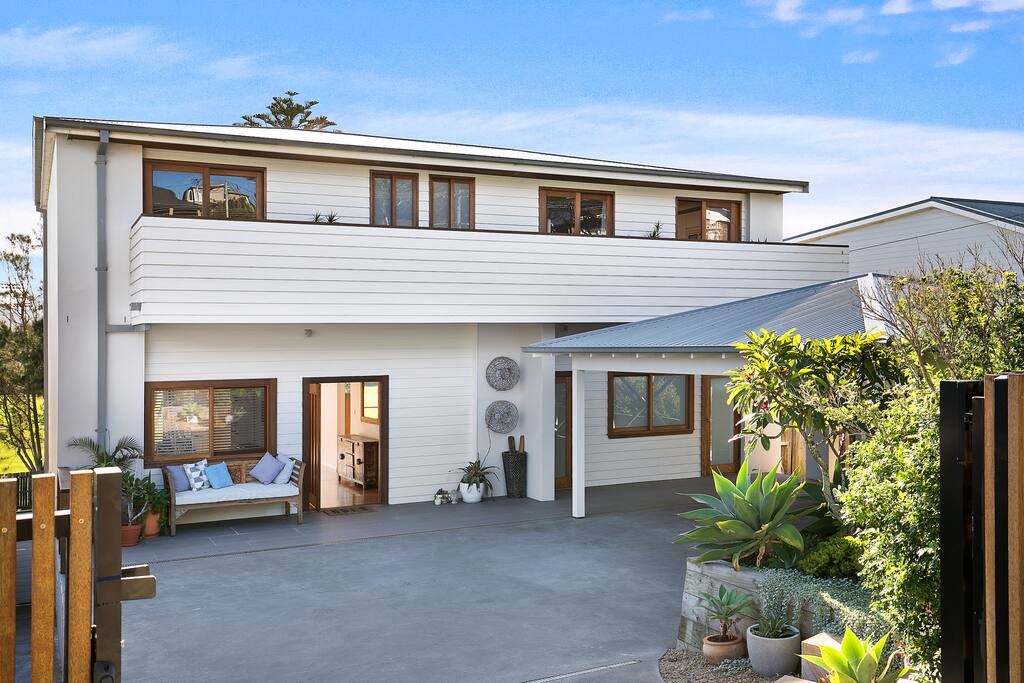 Secure Front Entry and Carport behind automated gate. Off-street parking for 4 cars