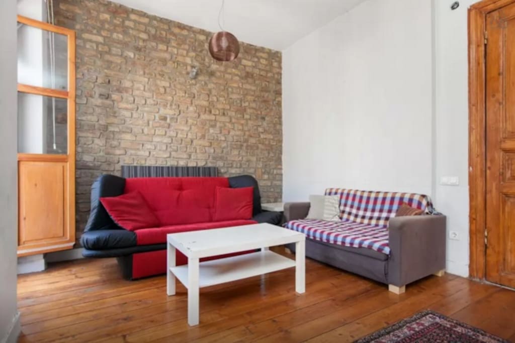 Comfy sofas with the original firebrick background