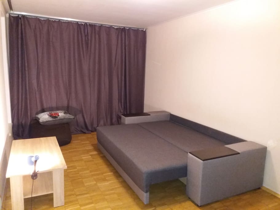 Open sofa, small table, black-out blinders, bag chair