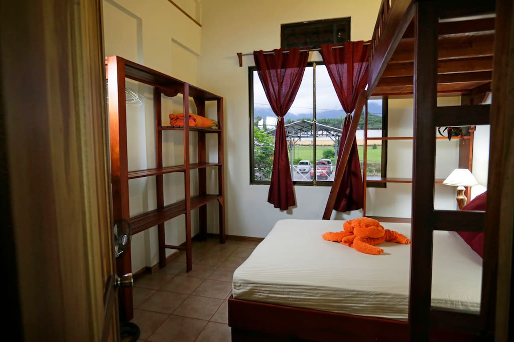 Second bedroom: Unique full size bed with single top bunk.