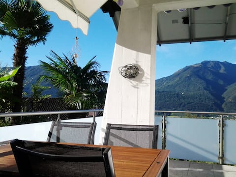 House sun view mountains lake garden charging 11 kW electric car