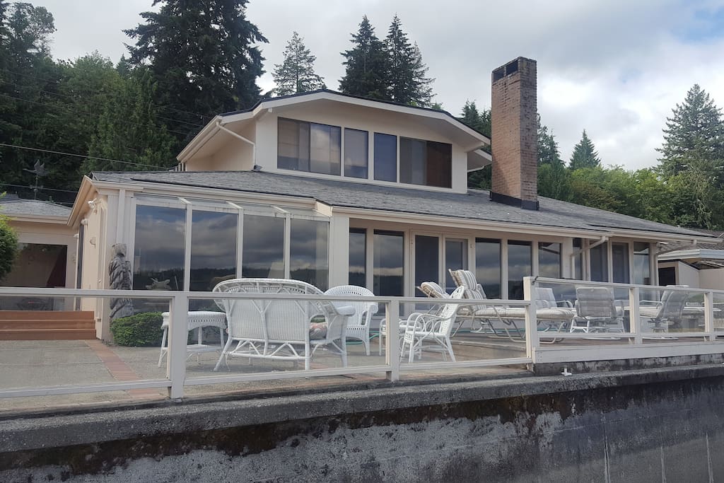 Two upstairs bedrooms and roomy master suite all have canal views