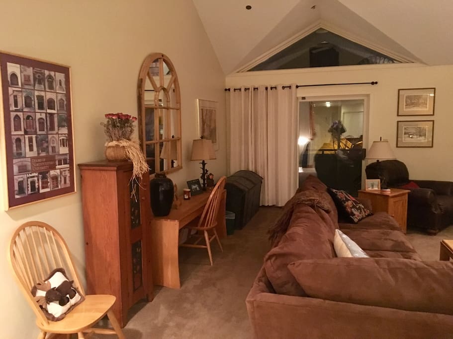 Family room with cathedral ceiling, work station...