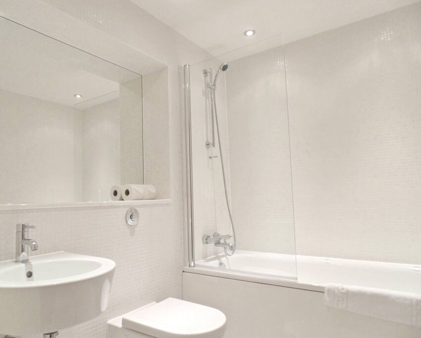 Bathroom with shower over bath