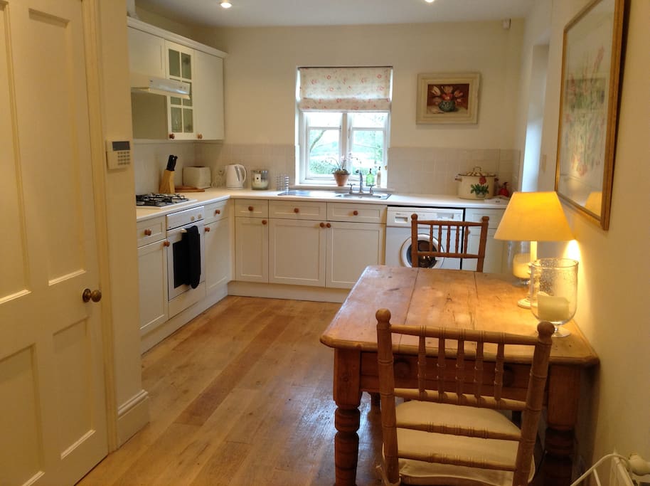 Well equipped kitchen with seating for two people
