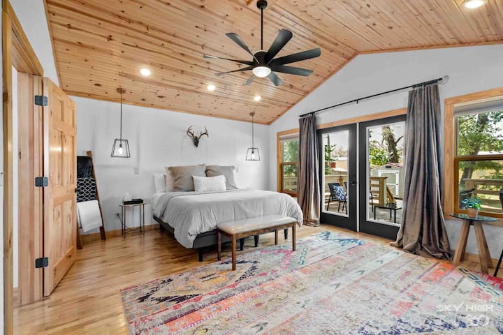 Cozy master suite with Serta icomfort adjustable, king bed. 