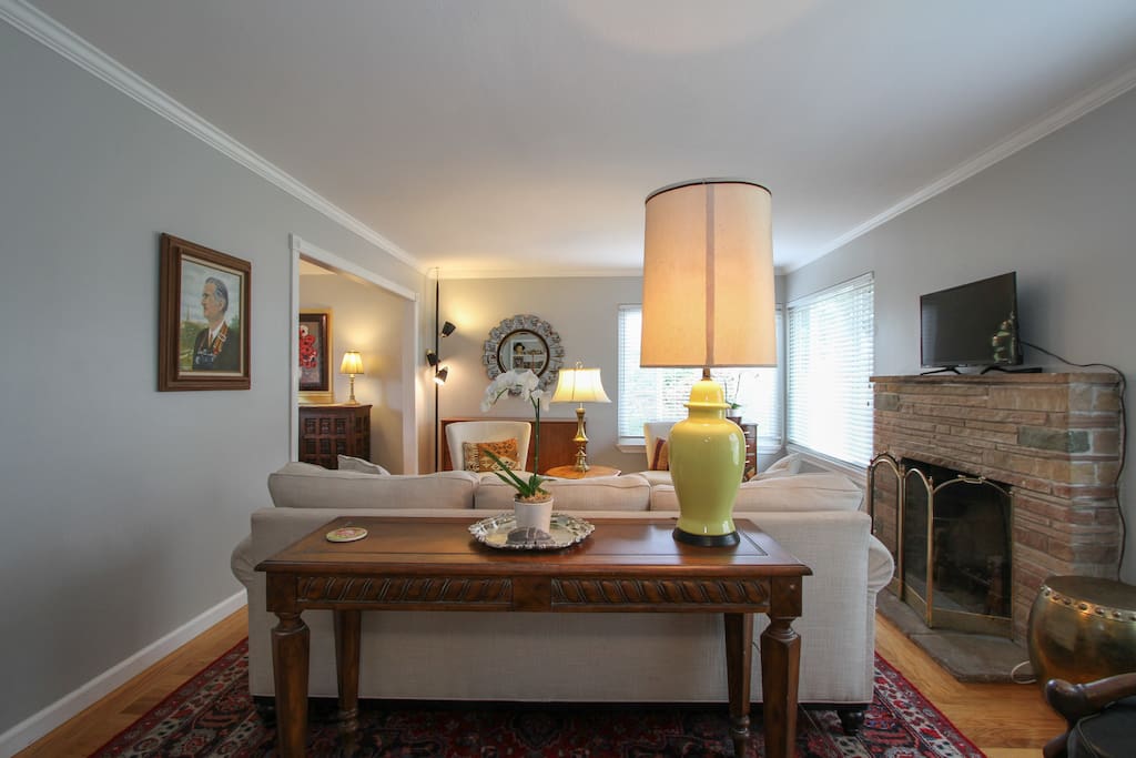 Mid century modern lamps and original artwork throughout