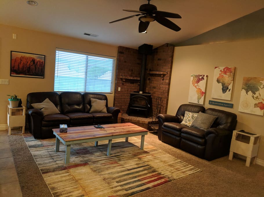 Living room with Lazy Boy leather reclining couches.