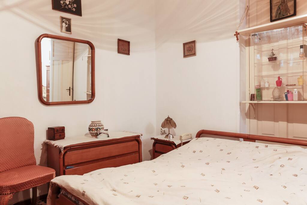 Master bedroom with a queen size bed.