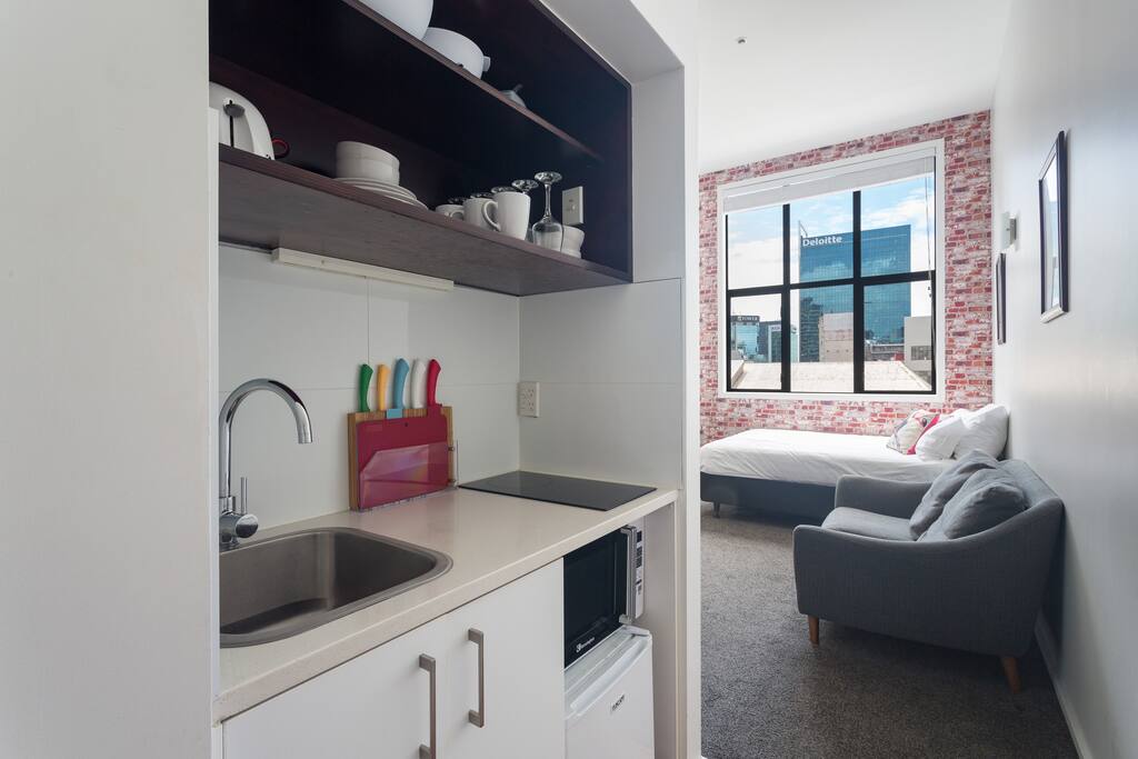 Entry into the apartment via kitchen