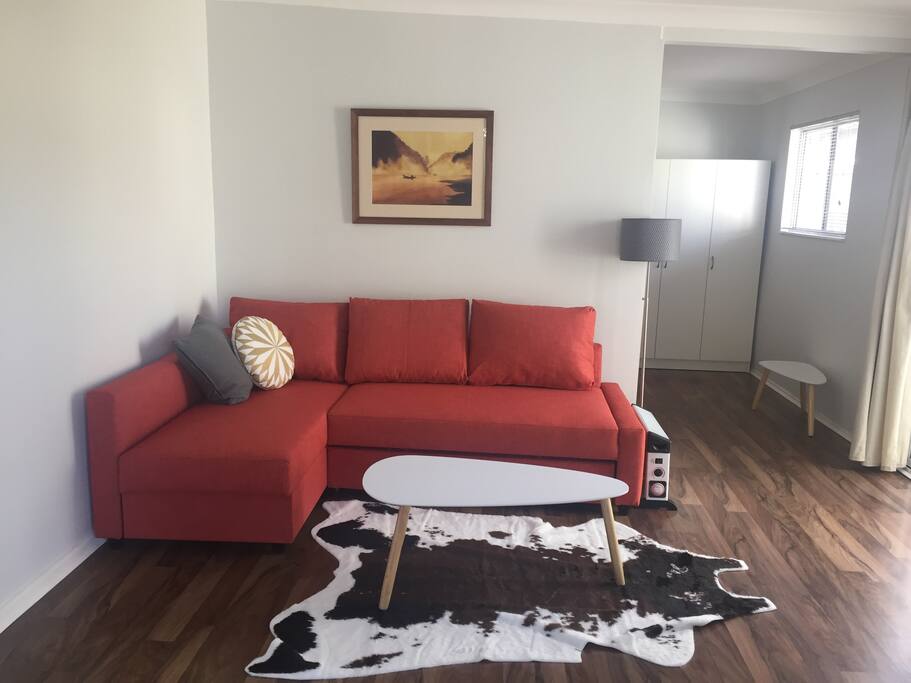 Relaxing lounge area, the apartment has wifi Internet. No television.