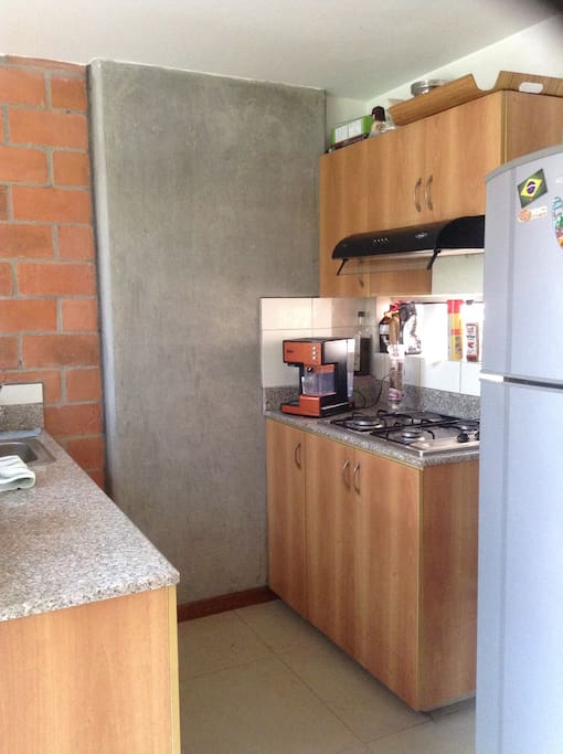 Kitchen with coffee maker, freezer and more