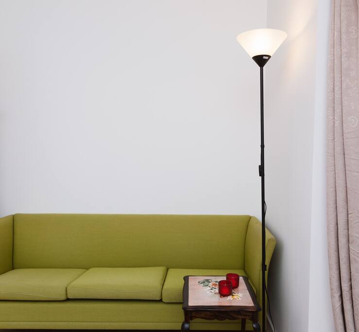A nice sofa in the bedroom