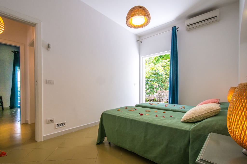 Twin bedroom with private terrace.