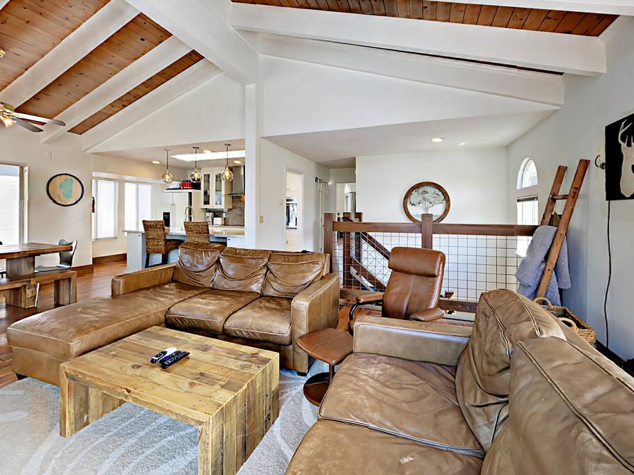 Plush leather sofas offer seating in the living room