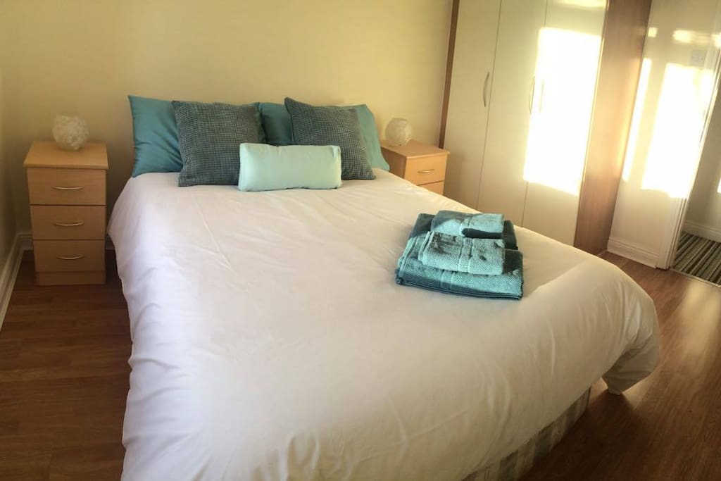 There are a wardrobe , 2 lamps and 2 drawers in the spacious double room.
