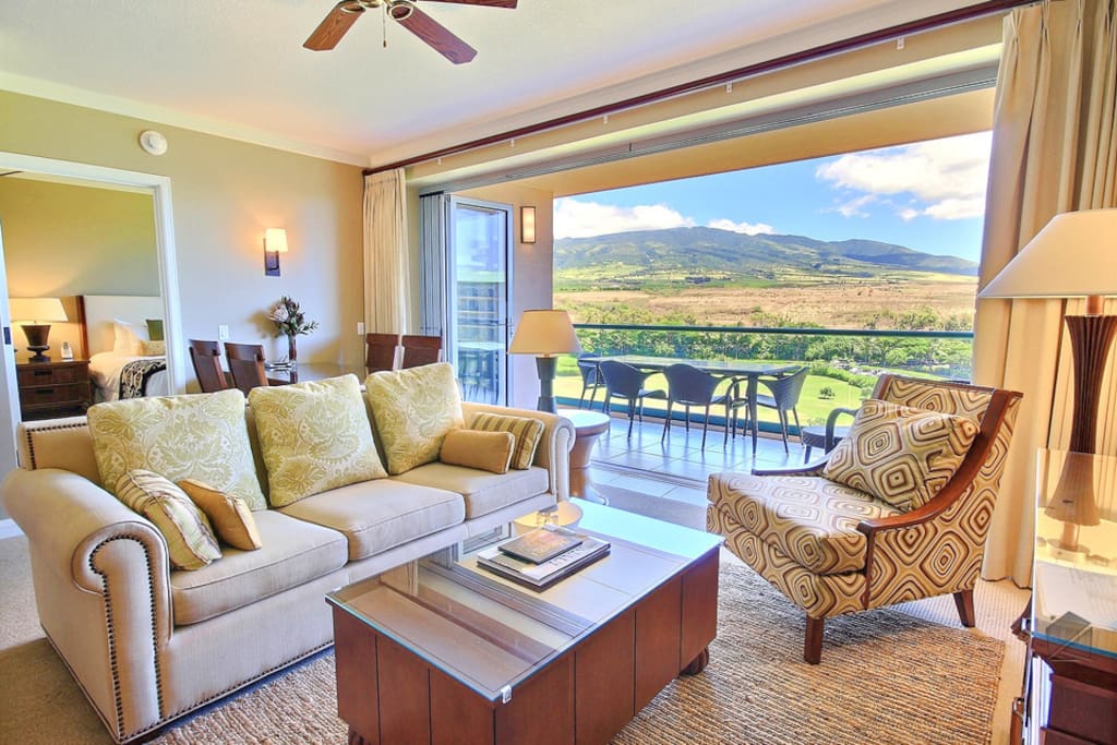 The bright and spacious living room has a queen size sofa sleeper for extra guests.