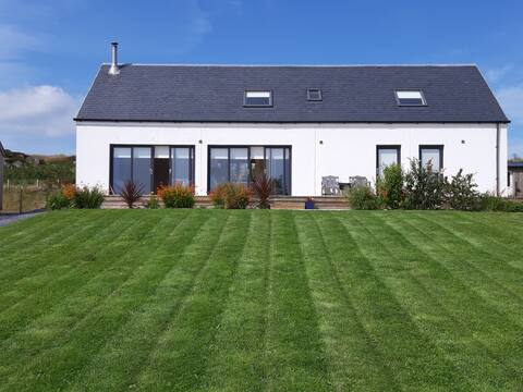 Gartartan Port Ellen  Modern home with sea views