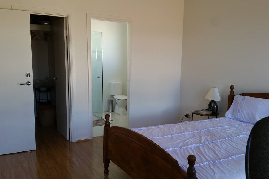 Large bedroom with work space, en-suite and walk-in robe