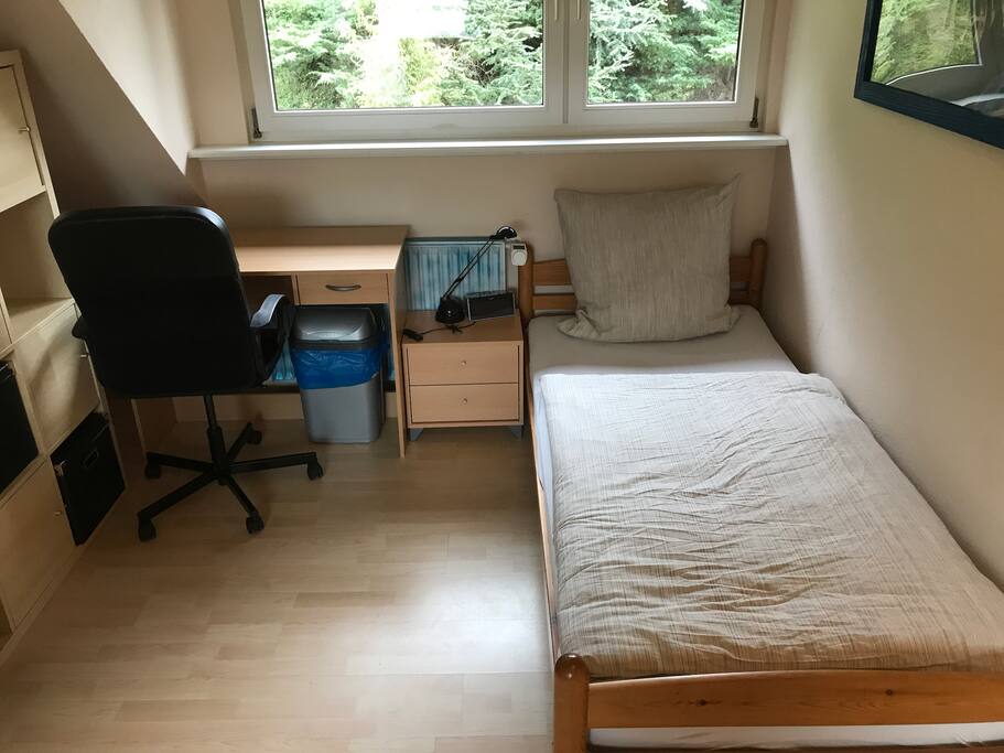 The single bed and a small desk for your laptop. By the way, we have very fast internet and a laserprinter you can use for free.