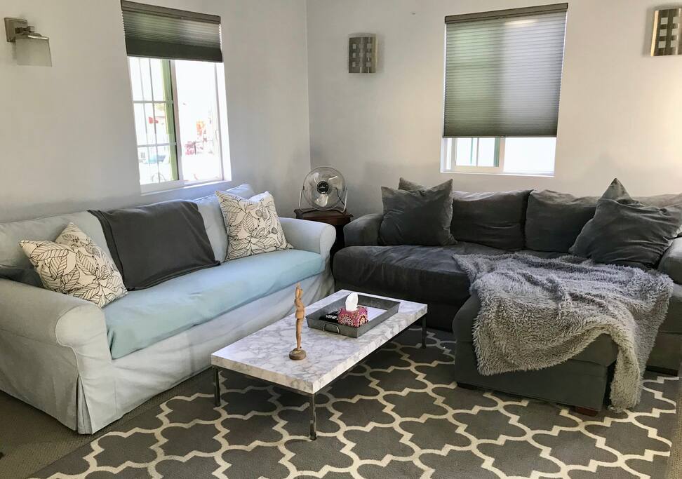 Cozy couches with loads of pillows and blankets, to relax on after a long day!