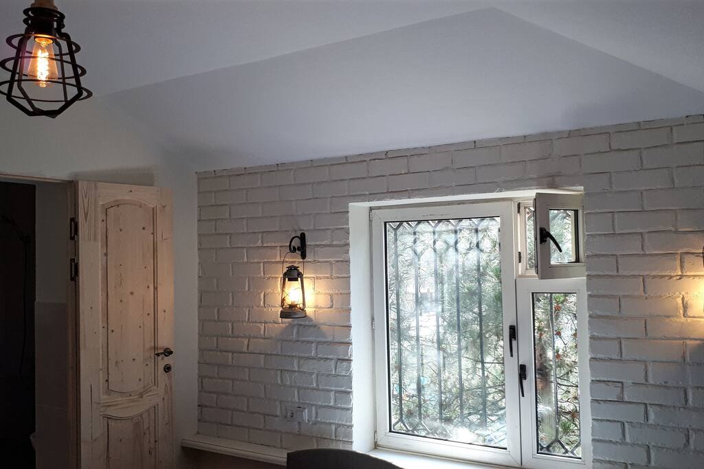 Comfortable room looking toward the pine trees