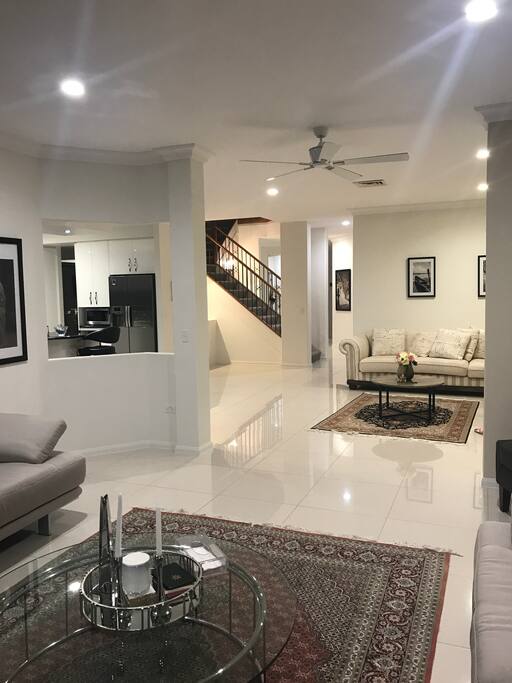 Three different living area with huge space and comfy couches