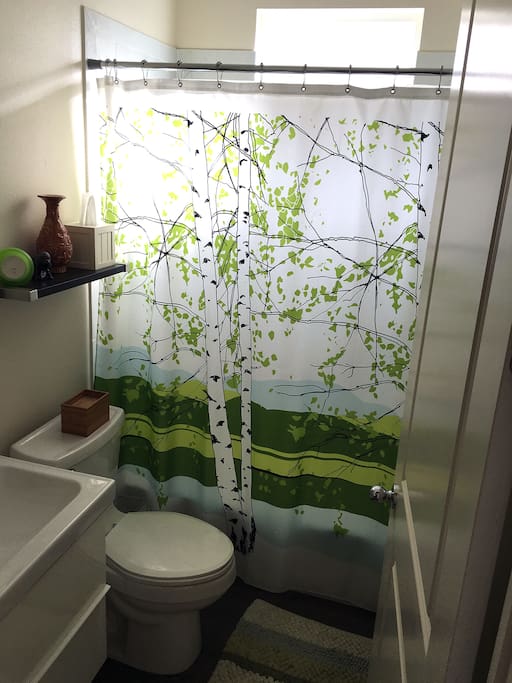 Private bathroom next to bedroom.