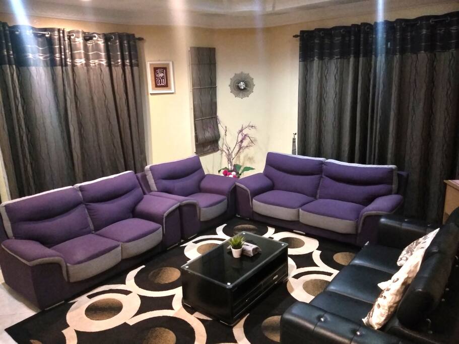 A cozy living room with airconditioning, Unifi TV and high speed wifi.