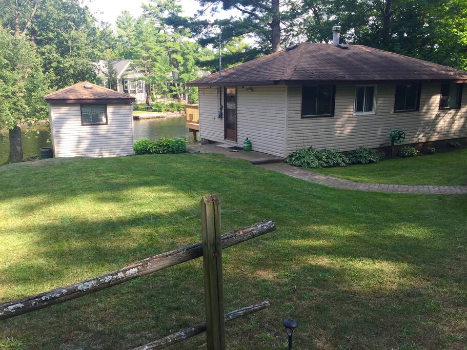 Clean and well-kept property surrounded by trees.