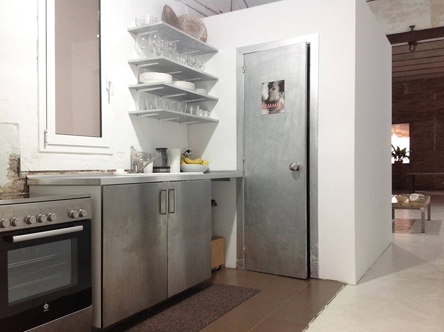 Kitchen and bathroom area right
