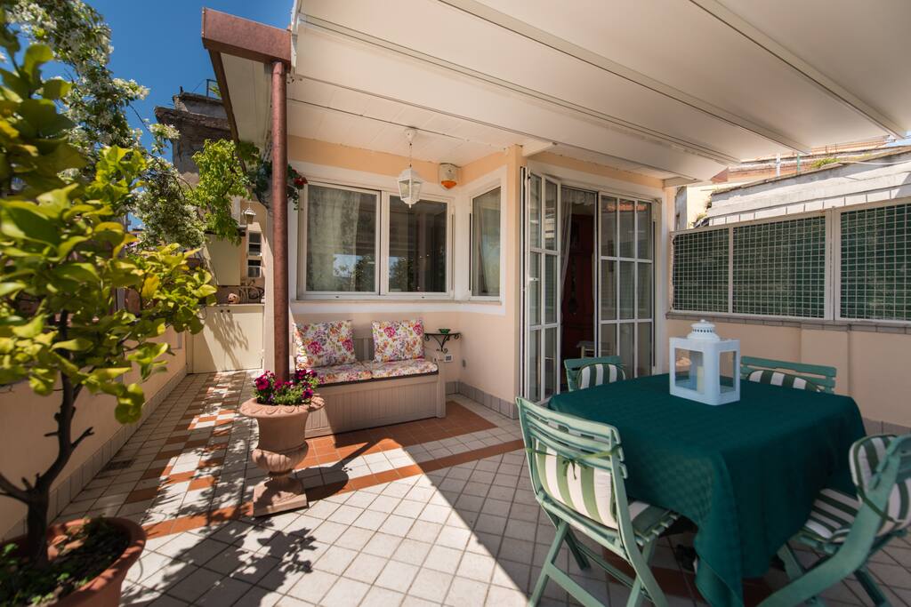 Terrace (30mq) with electric sun shade open