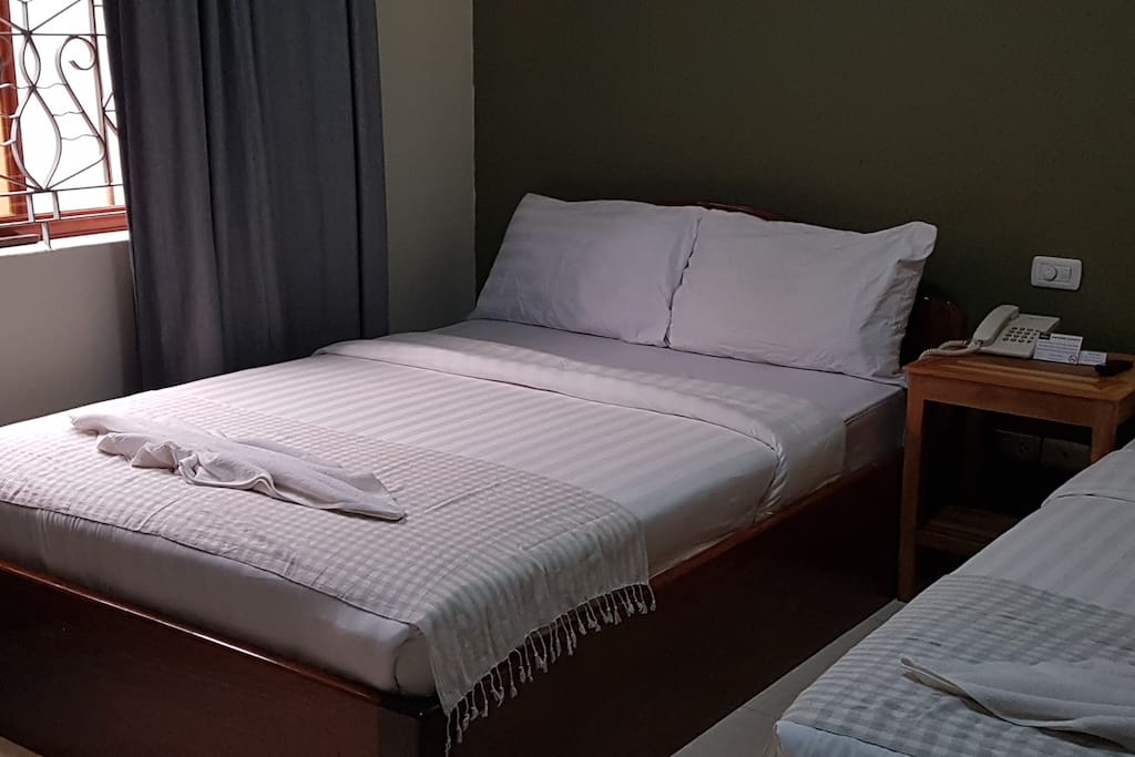 Comfortable bedding with a cool and relaxing colour scheme