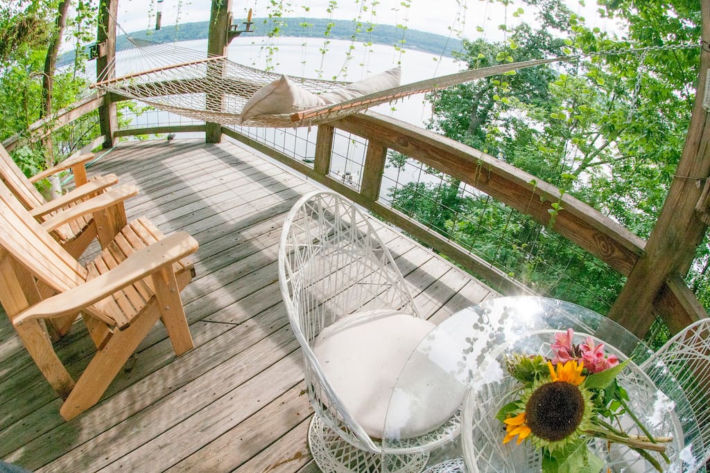 Wide-angle view of private deck with hammock.