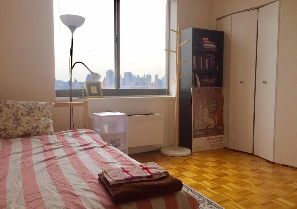 Comfortable Double Bed with intimate reading light, bedside drawer/table.