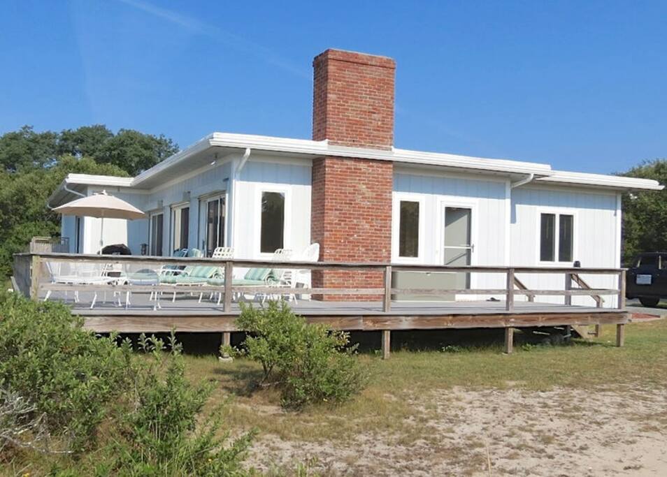 The architecture may be a bit unusual for the Cape, but this waterfront home has everything you'll need for a great vacation
