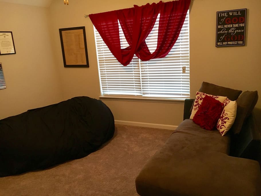 Bedroom 2. In addition to the lounge seen on the right will be a queen bed