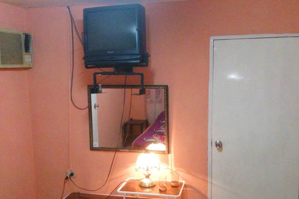 TV and Air Conditioner inside the Bedroom