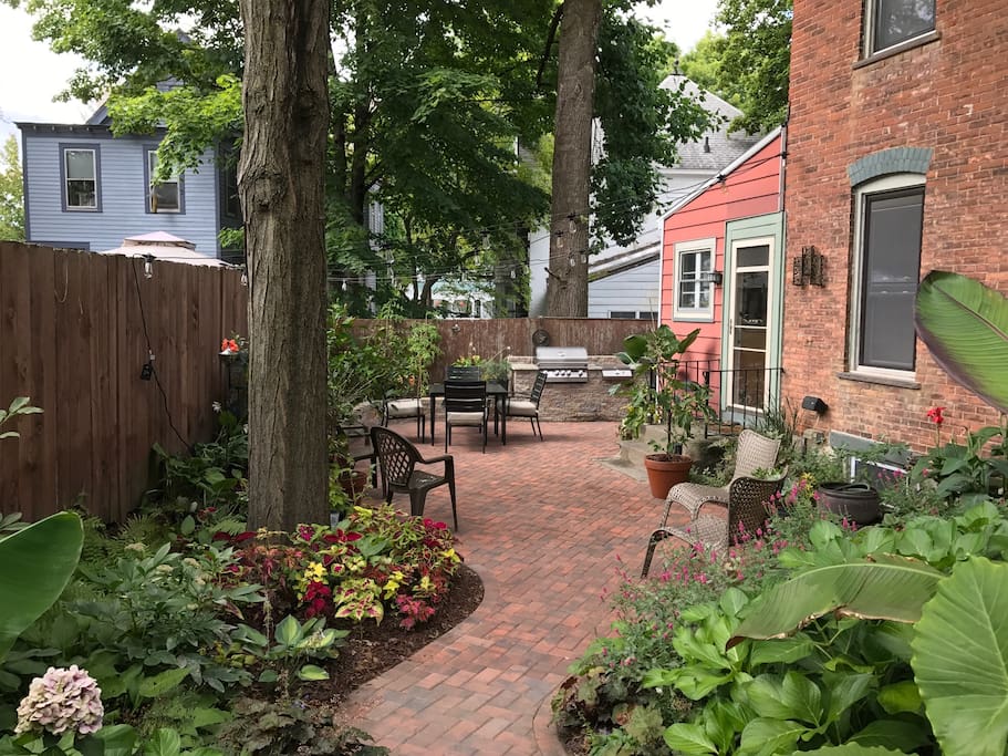 We love to garden and welcome you to share our brick patio with multiple seating areas.