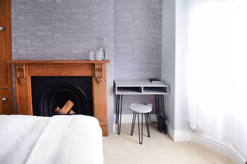 Guest bedroom- working desk and bay window