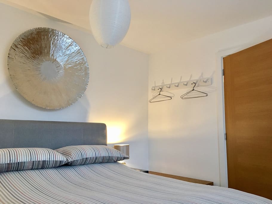 A light, airy room with space to hang a few personal items.