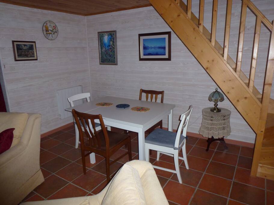 Gite dining area and stairs to family bedroom.