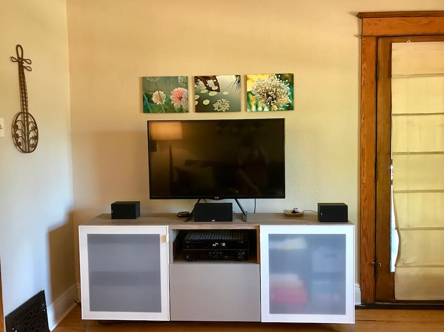 Large television with surround sound in living room